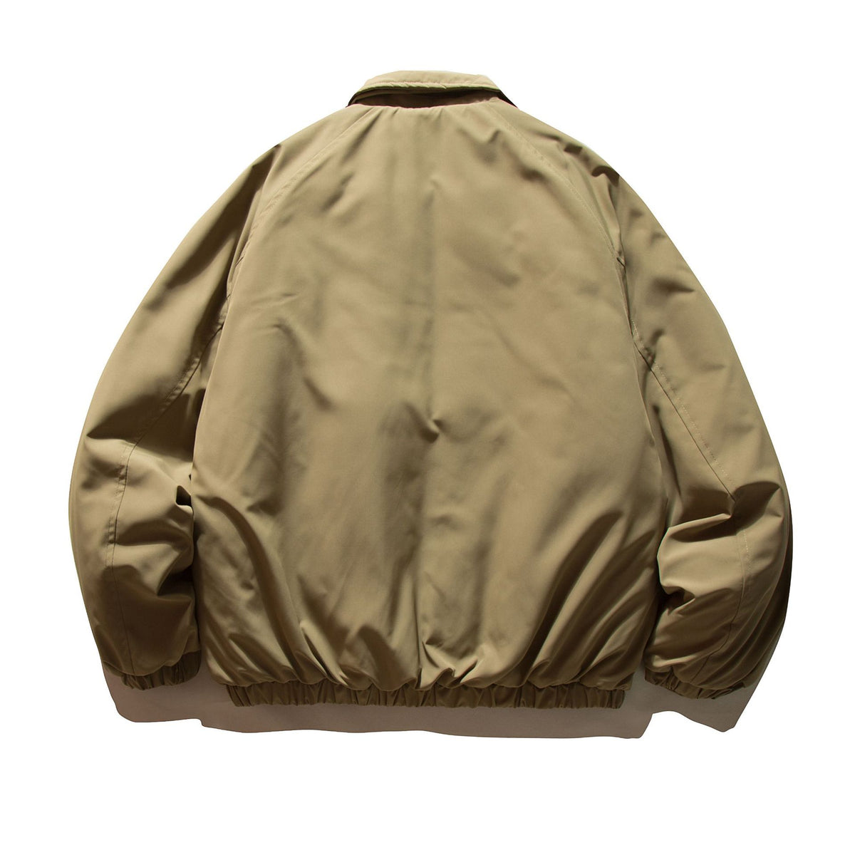 Men's short padded jacket with raglan sleeves, large flap pockets, and elastic hem EVA-US
