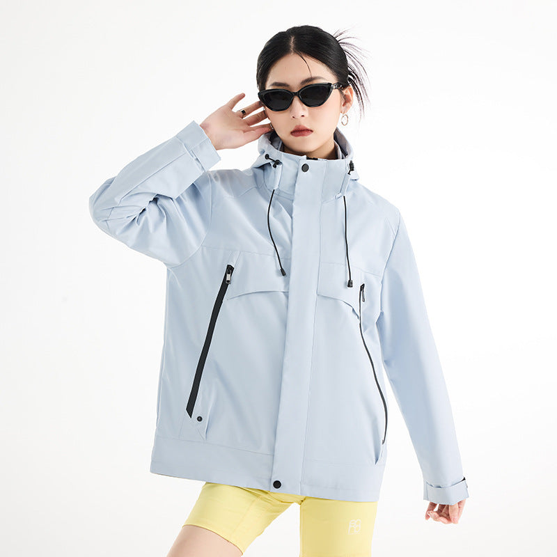 Women's technical waterproof oversized parka with hood and concealed zip pockets EVA-US
