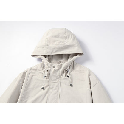 Unisex Light windproof hooded jacket in boxy cut with drawstring and concealed front EVA-US