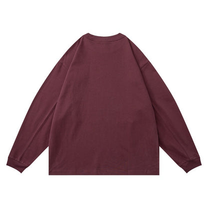 Unisex Oversized Long Sleeve Shirt made of heavy cotton blend with round neck and subtle chest embroidery EVA-US