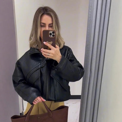 Women's oversized bomber jacket made of textured faux leather with overlapping flap front EVA-US