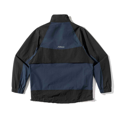 Unisex Lightweight Colorblock Windbreaker in Boxy Cut with High Stand-Up Collar and Drawstring Hem EVA-US