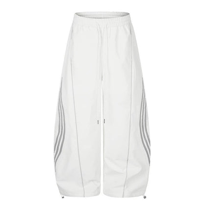 Women's Wide Tech Material Palazzo Pants with Drawstring Waistband, Reflective Side Stripes and Adjustable Cord Hem