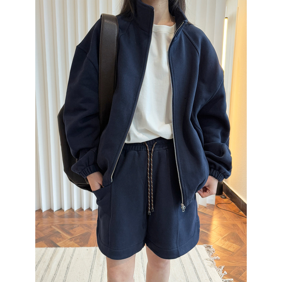 Women's Lounge Set consisting of sweatshirt with stand-up collar and drawstring shorts EVA-US