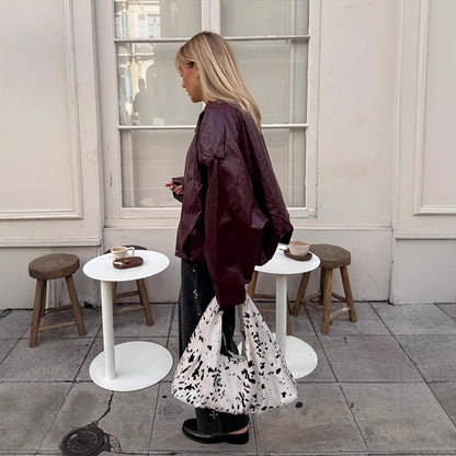 Women's short jacket in glossy patent look with boxy silhouette and dropped shoulders EVA-US