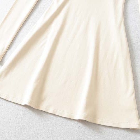 Ladies form-fitting mini dress with a deep V-neckline, gathered bust, and crossed back straps EVA-US