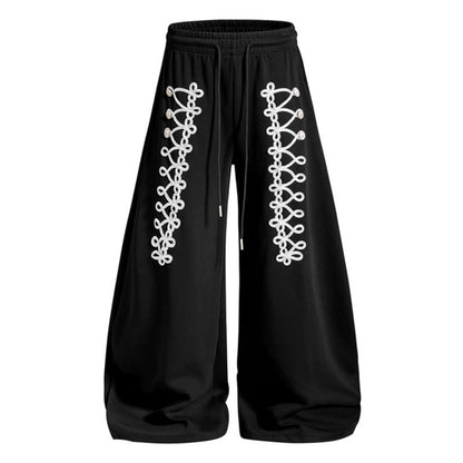 Women's loose jogging pants with elastic waistband and decorative lacing EVA-US