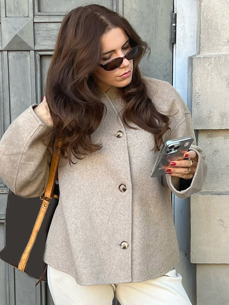 Women's short coat made of wool blend with boxy silhouette and distinctive button placket EVA-US
