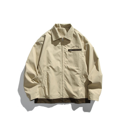 Unisex Boxy transitional blouson jacket with full-length zipper, chest zip pocket, and contrasting ribbed hem EVA-US