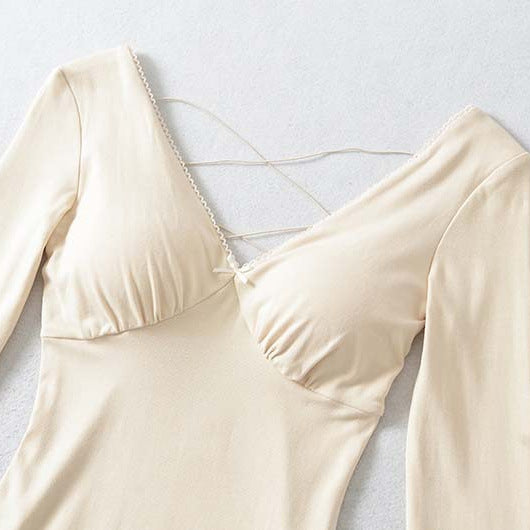 Ladies form-fitting mini dress with a deep V-neckline, gathered bust, and crossed back straps EVA-US