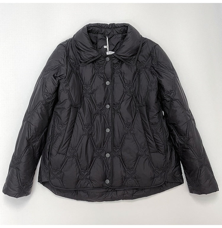 Women Short Cut Quilted Jacket with Decorative Stitching and Rounded Hem EVA-US