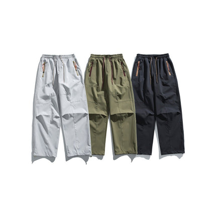 Men's cargo pants with elastic waistband, knee panels, and zip hem EVA-US