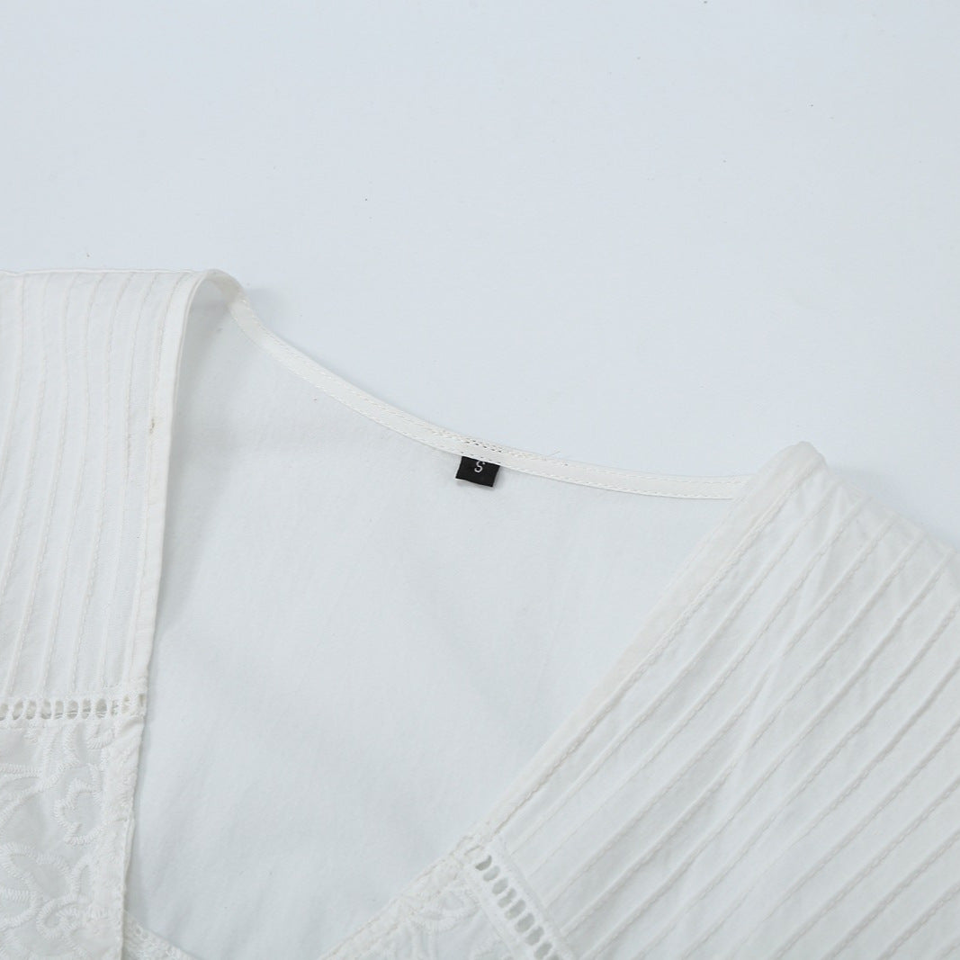 Women's blouse with V-neckline, broderie embroidery, and voluminous puff sleeves EVA-US