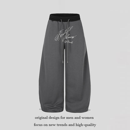 Women's Wide Culotte Sweatpants with High Waist, Drawstring, and Elegant Script Print