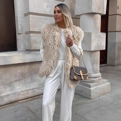 Women's Longer Cozy Faux Fur Vest with Shaggy Look and Front Pockets EVA-US