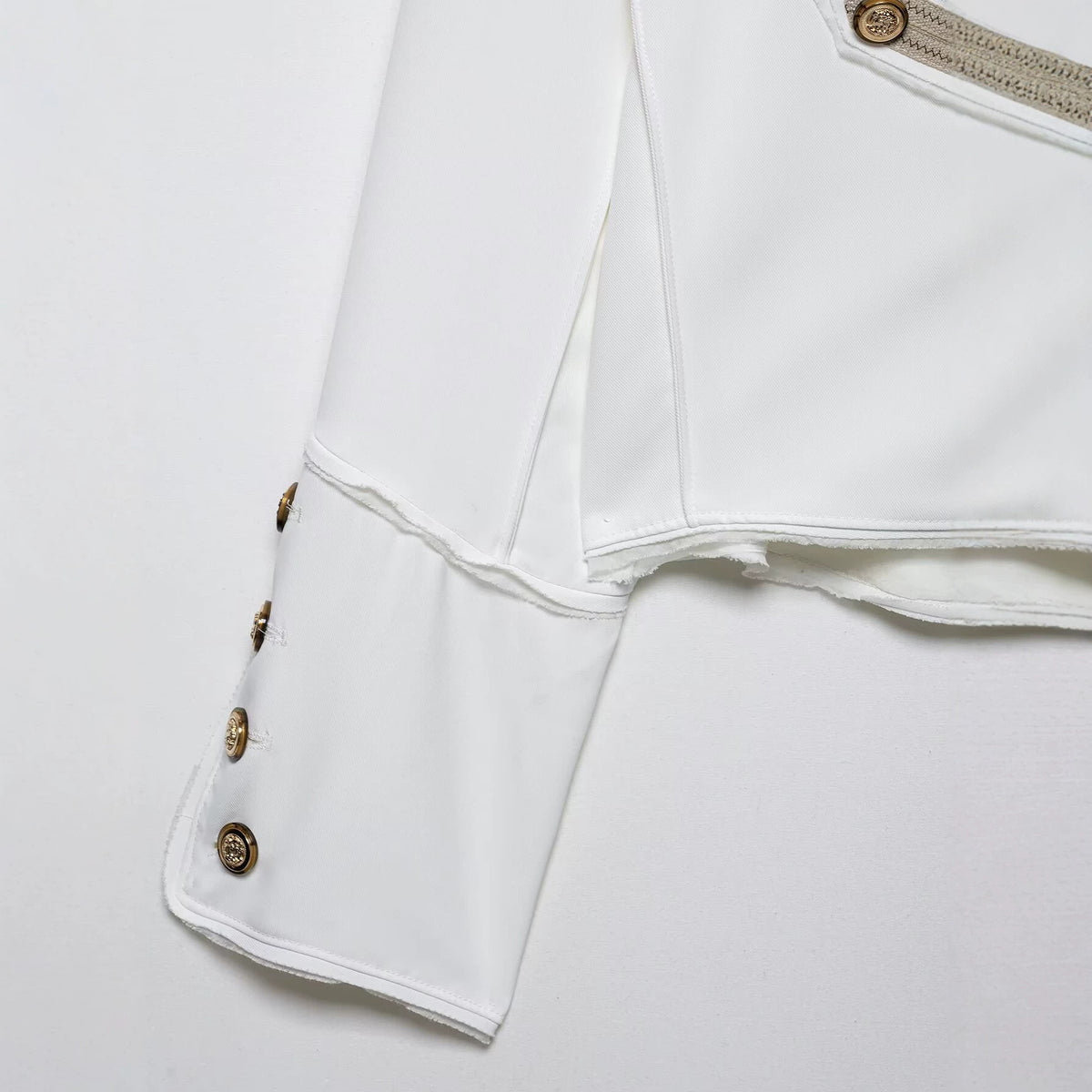 Ladies short jacket in military style with asymmetrical decorative strip, shoulder epaulettes and gold buttons EVA-US