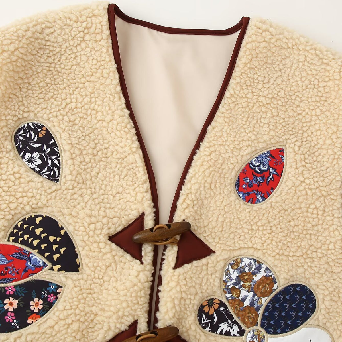 Ladies Padded Teddy Vest with Patchwork Applications and Toggle Closures EVA-US