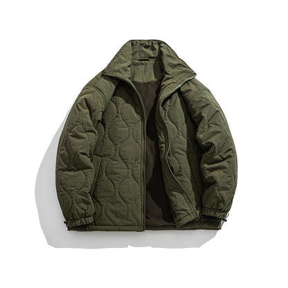 Unisex Boxy quilted jacket in military liner style with high stand-up collar and adjustable hem EVA-US