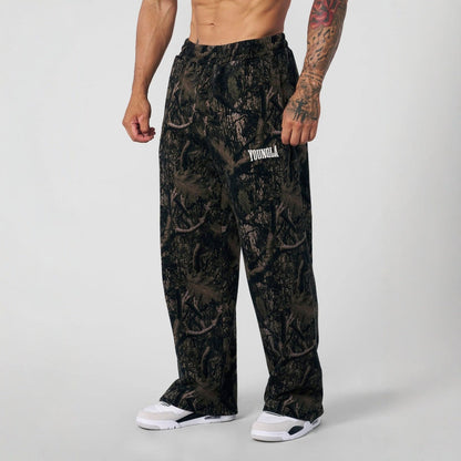 Men's oversized camouflage jogging pants with elastic comfort waistband and thigh logo EVA-US