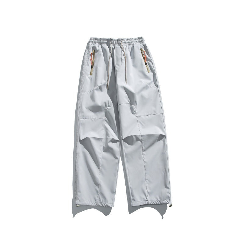 Men's cargo pants with elastic waistband, knee panels, and zip hem EVA-US