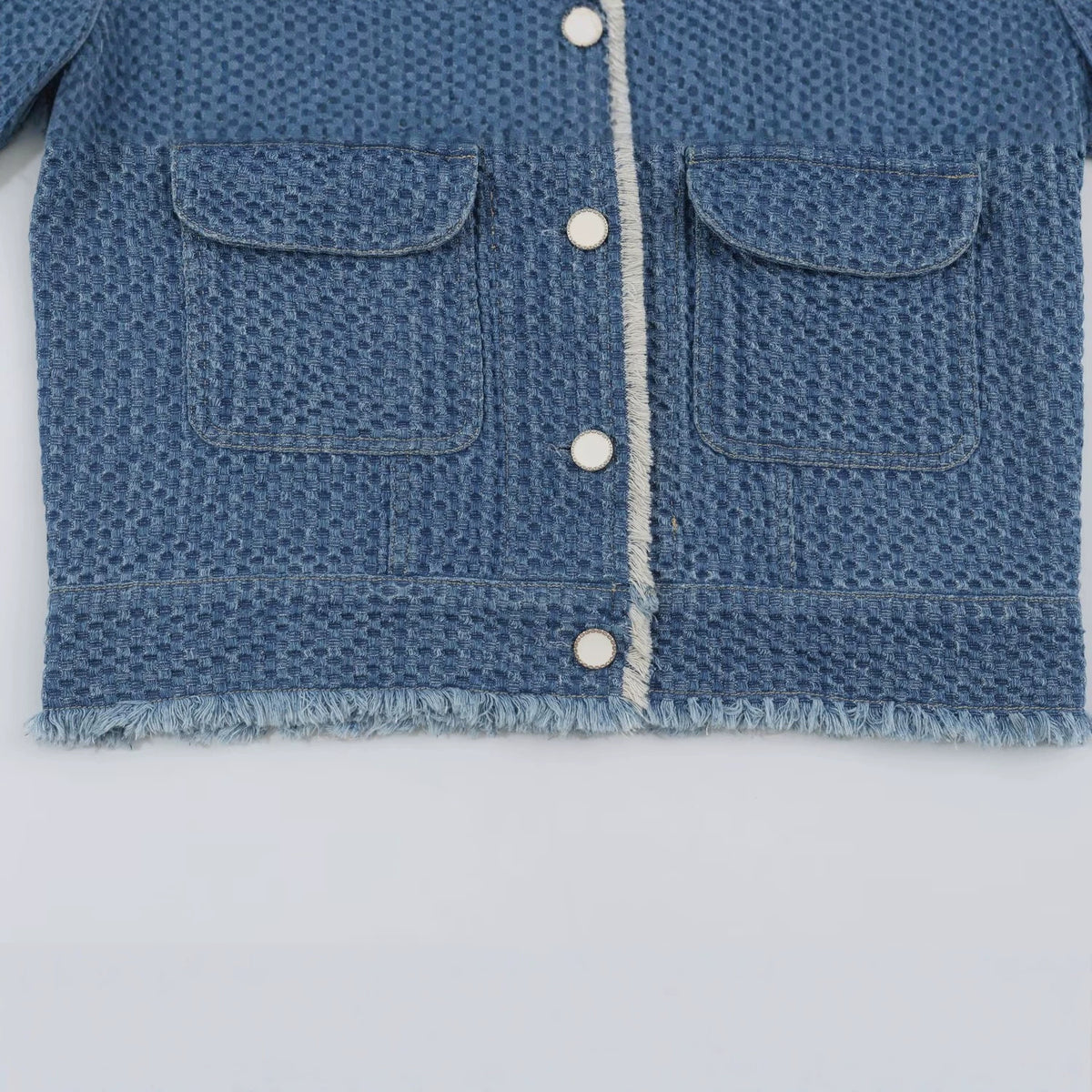 Women's short jacket made of textured denim with fringe trim and flap pockets EVA-US