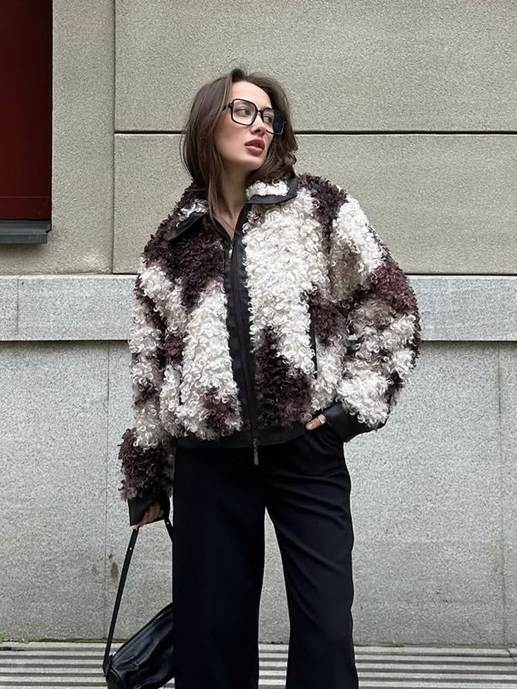 Women's short jacket made of curly bouclé faux fur with leather look detailing EVA-US
