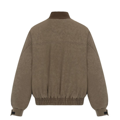 Men's short boxy blouson made of corduroy fabric with high ribbed collar and elastic hem.