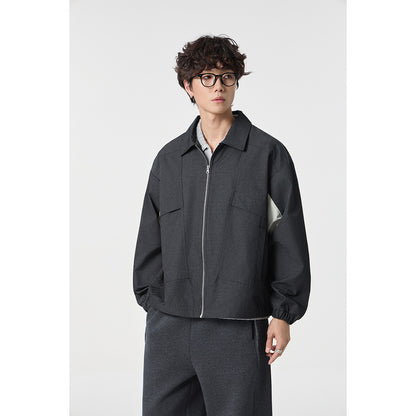 Unisex short jacket in boxy cut with continuous zipper and flap pockets EVA-US
