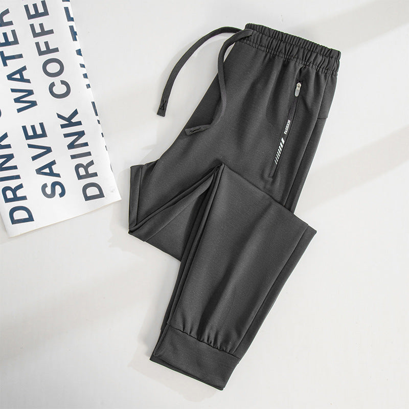 Men's Sporty Jogging Pants with Zipper Pockets, Elastic Waistband, and Slim Fit