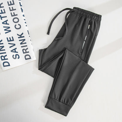 Men's Sporty Jogging Pants with Zipper Pockets, Elastic Waistband, and Slim Fit