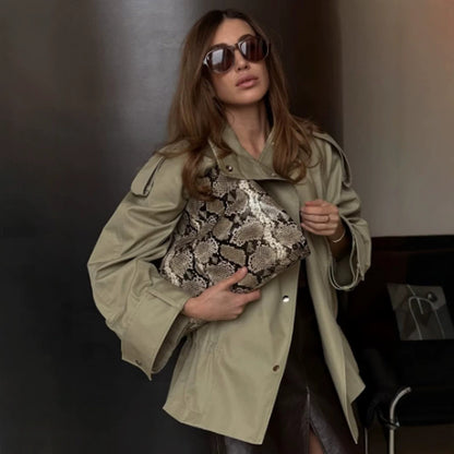 Women's short parka with high stand-up collar, shoulder flaps and adjustable drawstring EVA-US