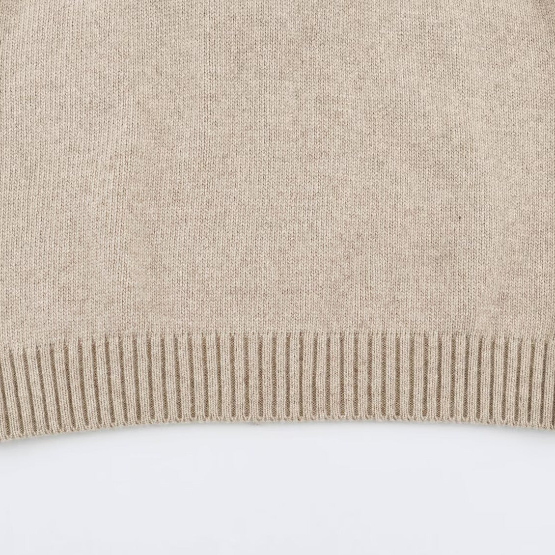 Women's fine knit vest with hood, button placket, and ribbed waistband EVA-US
