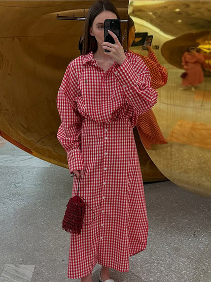 Women's checkered maxi dress with continuous button placket, fitted sash, and extended cuffs EVA-US