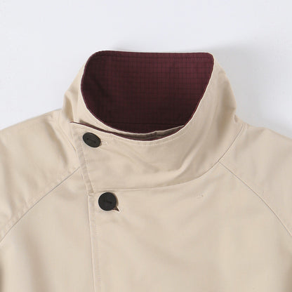 Women's short jacket with high stand-up collar and asymmetrical button placket EVA-US