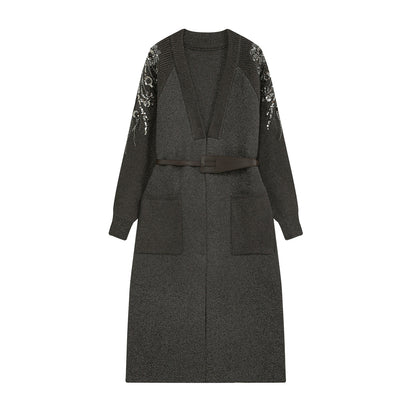Women's knit midi dress with deep V-neck, waist belt, and sequin-adorned sleeves EVA-US