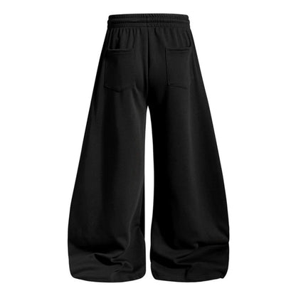 Women's loose jogging pants with elastic waistband and decorative lacing EVA-US