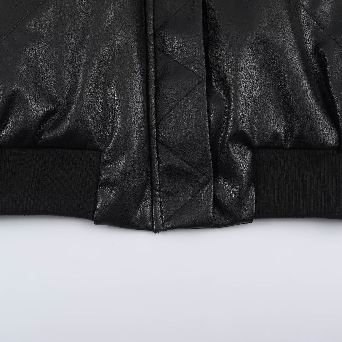 Women's bomber jacket in leather look with hidden flap, figure-hugging ribbed waistband and slanted flap pockets EVA-US