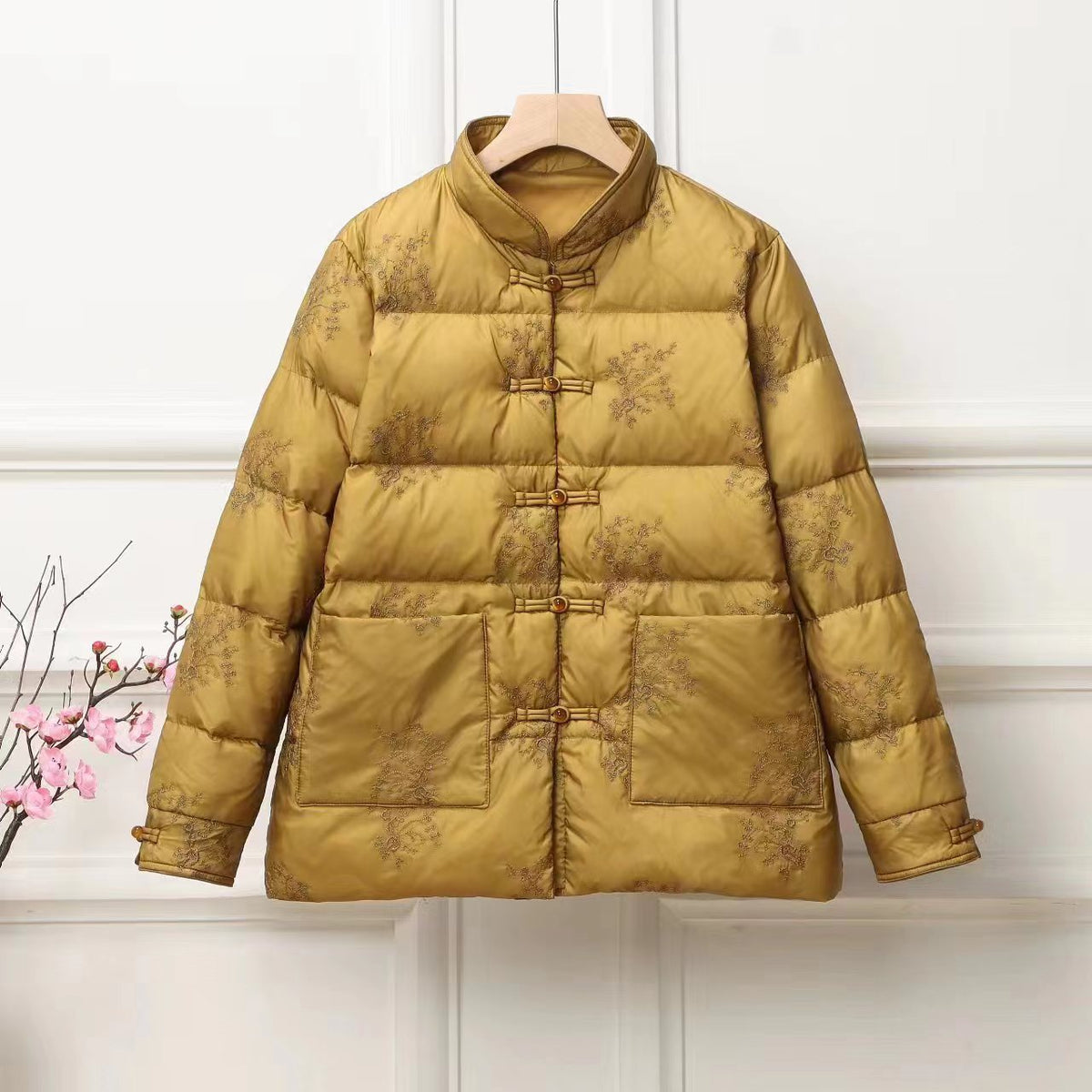 Women's padded quilted jacket with stand-up collar and traditional button placket EVA-US