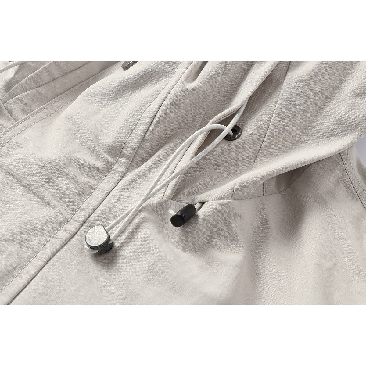 Unisex Light windproof hooded jacket in boxy cut with drawstring and concealed front EVA-US