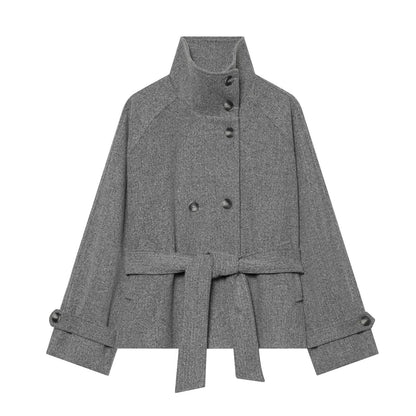 Women's cape transitional jacket in a short cut with a high collar, double button placket, and waist tie belt EVA-US