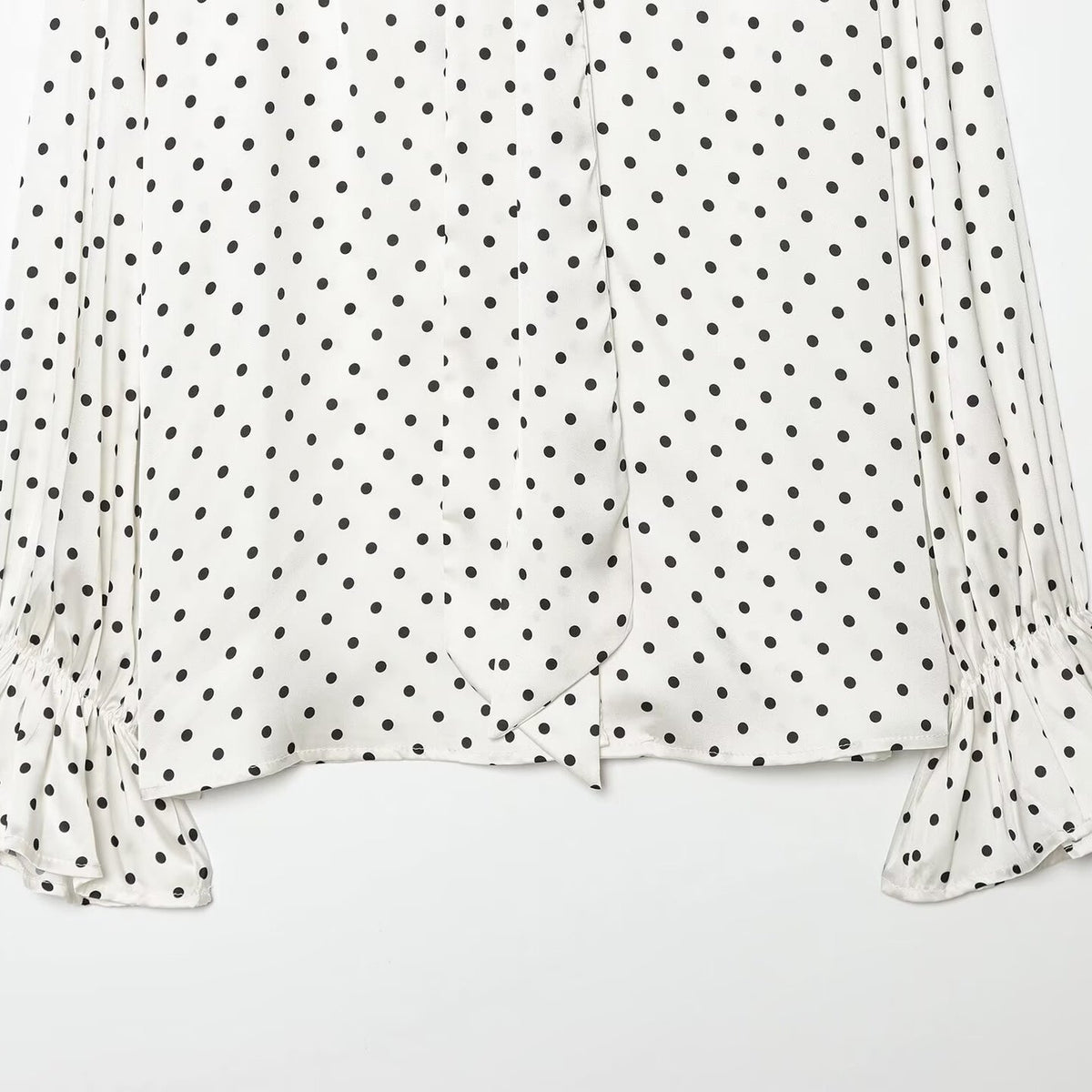 Women's blouse with bow collar, polka dot pattern and flounce sleeves EVA-US