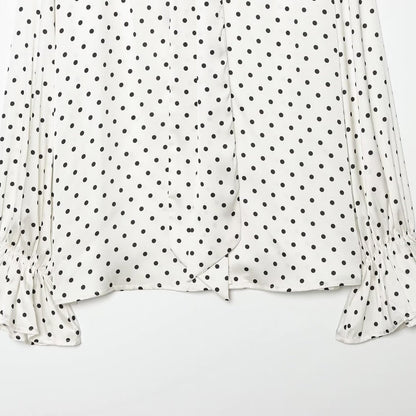 Women's blouse with bow collar, polka dot pattern and flounce sleeves EVA-US