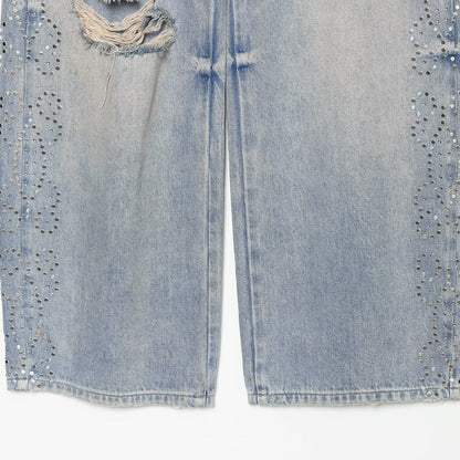 Women's jeans with a high waist, wide leg, rhinestone trim, and destroyed details EVA-US