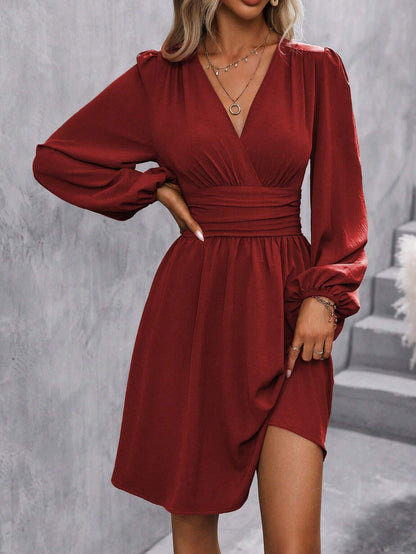 Women's wrap dress with a stylish V-neck and voluminous sleeves