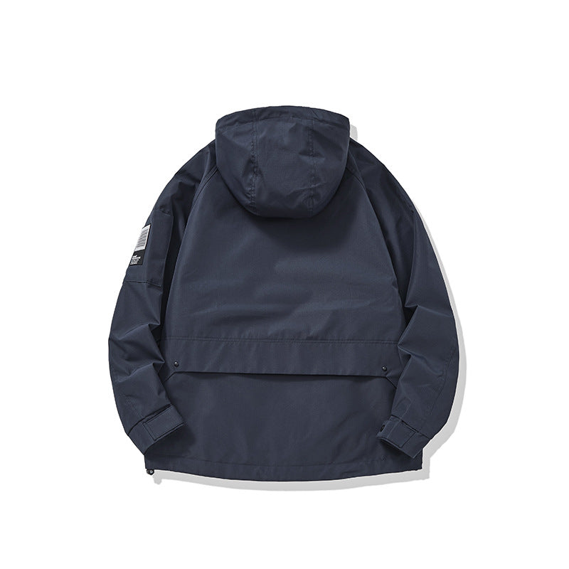 Unisex multifunctional outdoor parka in boxy cut with adjustable hood and asymmetrical zip pockets EVA-US