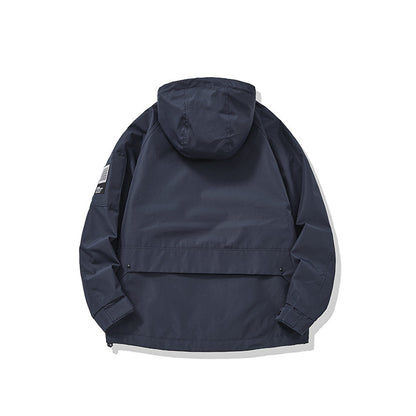 Unisex multifunctional outdoor parka in boxy cut with adjustable hood and asymmetrical zip pockets EVA-US