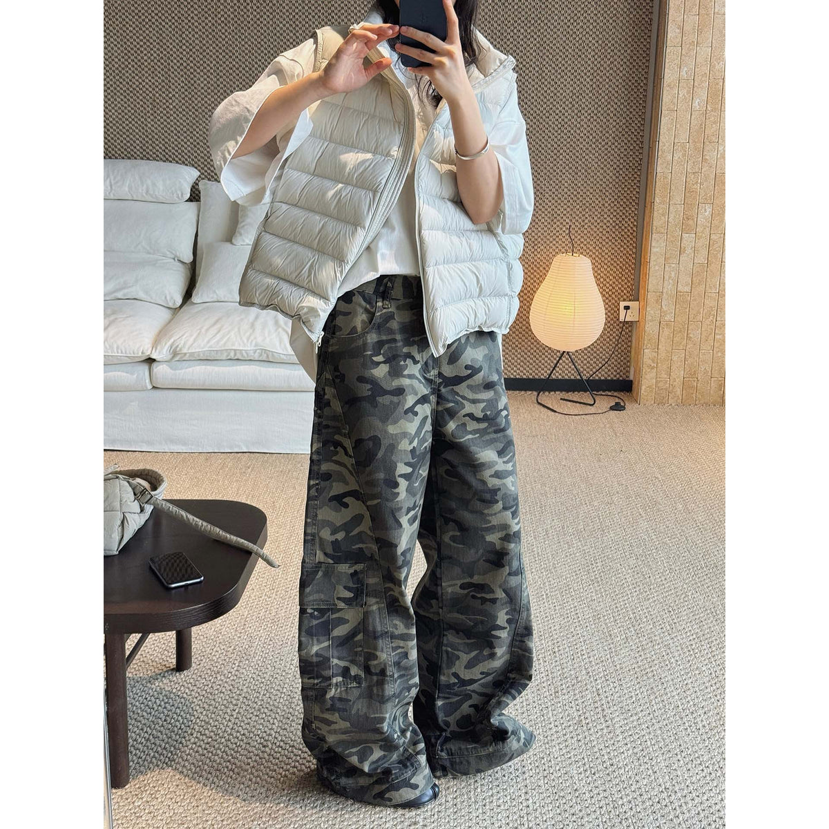 Women’s cargo pants in baggy cut with camouflage pattern and large flap pockets
