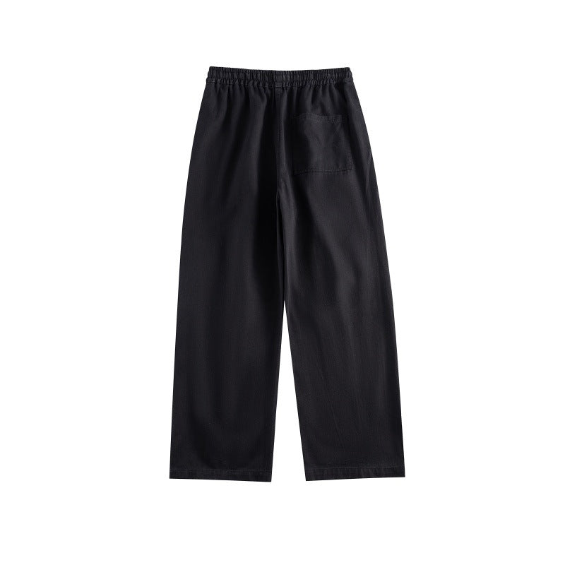 Women's wide utility-style culotte pants with elastic waistband, drawstring, and patch pockets.
