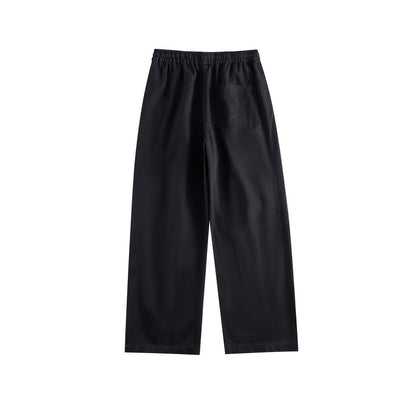 Women's wide utility-style culotte pants with elastic waistband, drawstring, and patch pockets.