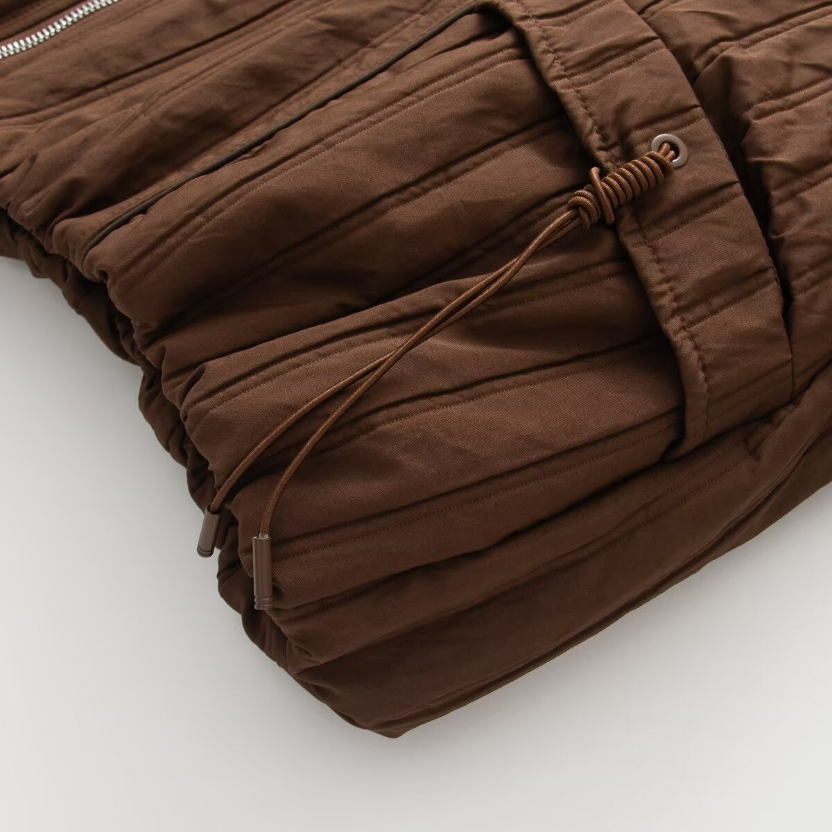 Women's padded jacket with hood, drawstring and loose fit EVA-US